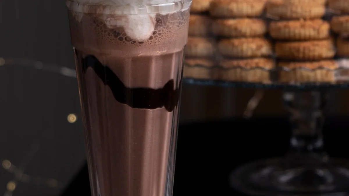 Chocolate milkshake with whipped cream and chocolate sauce