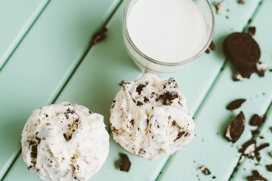 Two scoops of cookies-and-cream ice cream with chocolate cookie chunks
